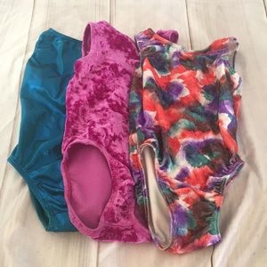 Three dance leotards